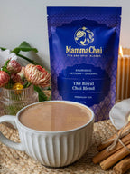 Mamma Chai tea package with a cup of tea and cinnamon stick.