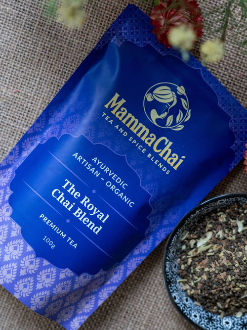 Mamma Chai tea Royal Chai Blend Tea package with a bowl of tea leaves